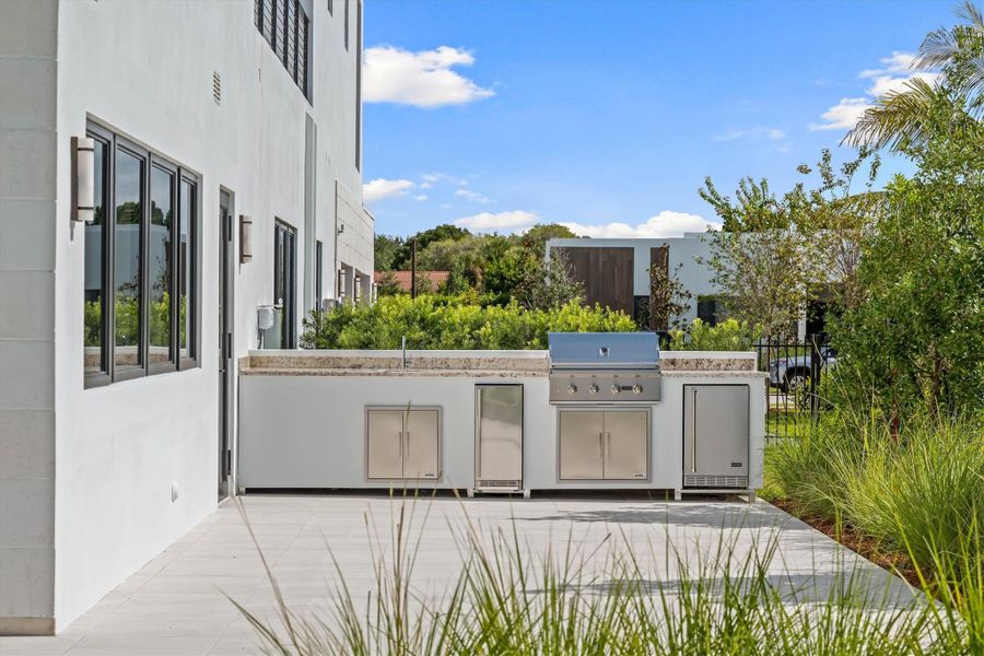 Exterior details and patio area of a home in , Weston (Image 49).