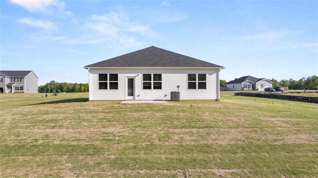 Front exterior of a new home in Fox Crossing, Griffin, GA, highlighting curb appeal (Image 2).