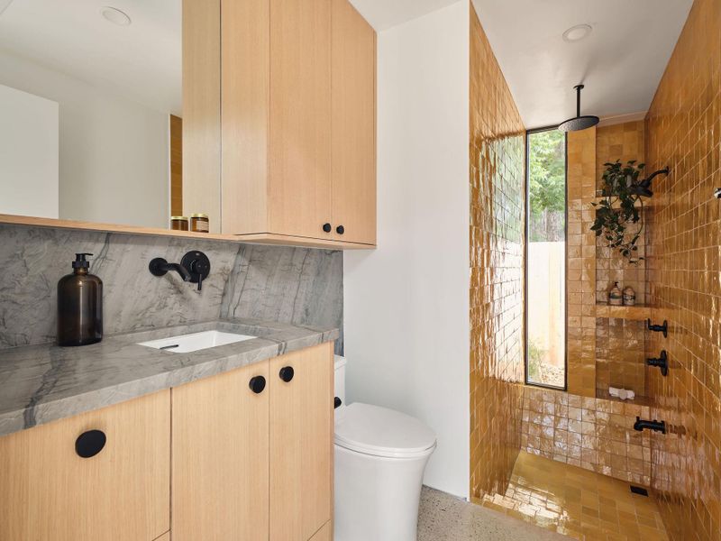 Few materials embody variation and individuality quite likezellige tile. With its centuries-old origins and hand-craftednuances, zellige introduces a layer of texture and history thatsets this space apart from the uniformity of contemporarydesign.