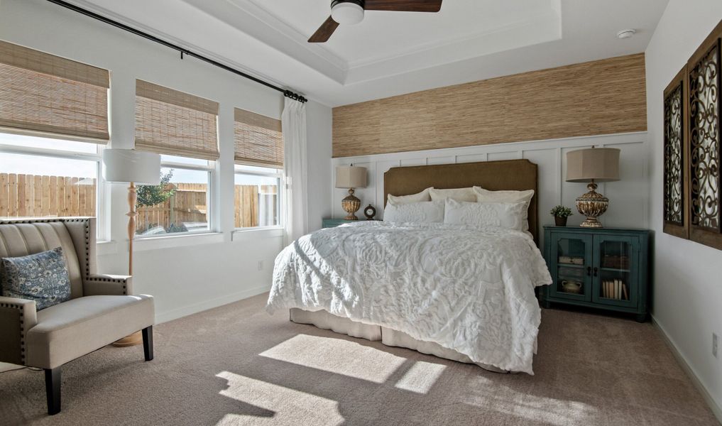 Primary suite with decorative feature wall