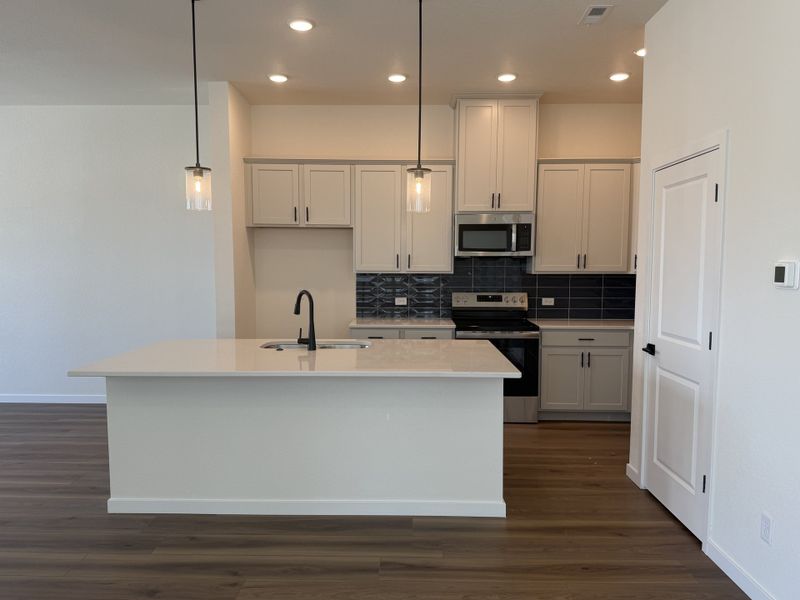 Furnished interior view inside a new home in Elevate at Wolf Ranch, Colorado Springs (Image 7).