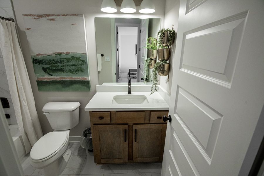 Representative furnished interior of a home built from the Willow by Grant & Co in Manor at Hall Creek, Arlington (Image 131).