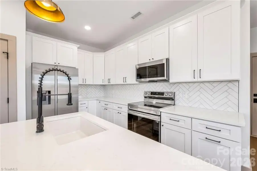 Furnished interior view inside a new home in , Hickory (Image 12).