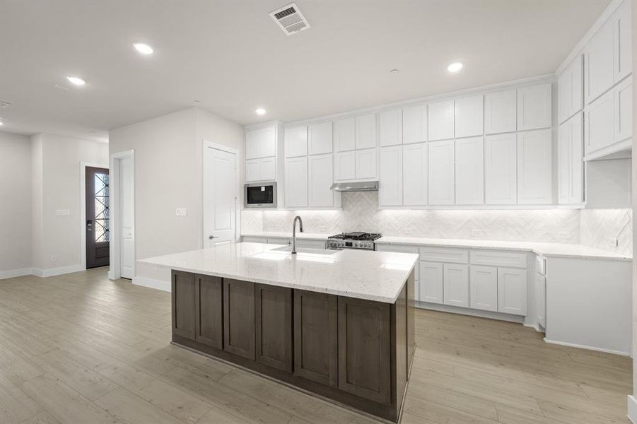 Furnished interior view inside a new home in The Abbey at Mercer Crossing, Farmers Branch (Image 14).