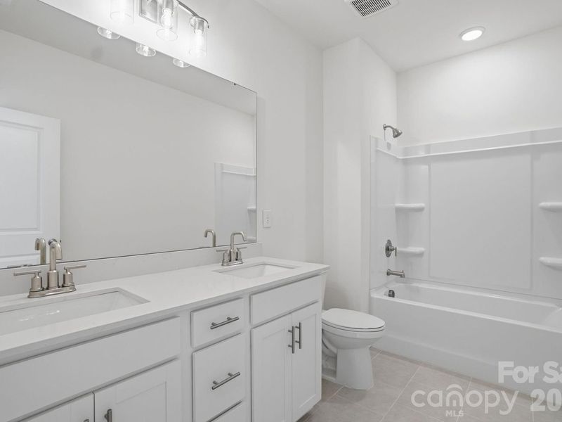 Furnished interior view inside a new home in Enclave at Belmont, Belmont (Image 30).