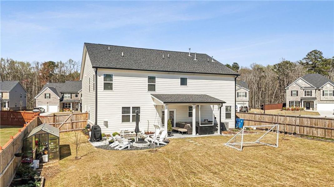 Exterior details and patio area of a home in Independence, Loganville (Image 36).