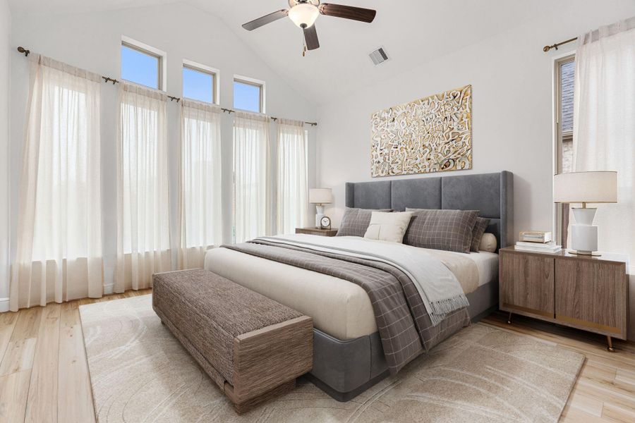 The primary bedroom offers a spacious layout, high ceilings, and abundant natural light for a relaxing retreat.