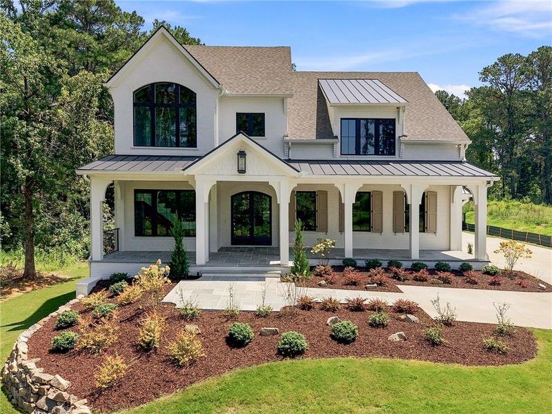 Front exterior of a new home in , Milton, GA, highlighting curb appeal (Image 32).