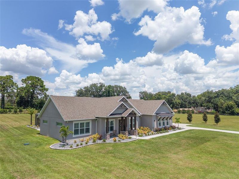 Front exterior of a new home in , Oxford, FL, highlighting curb appeal (Image 21).