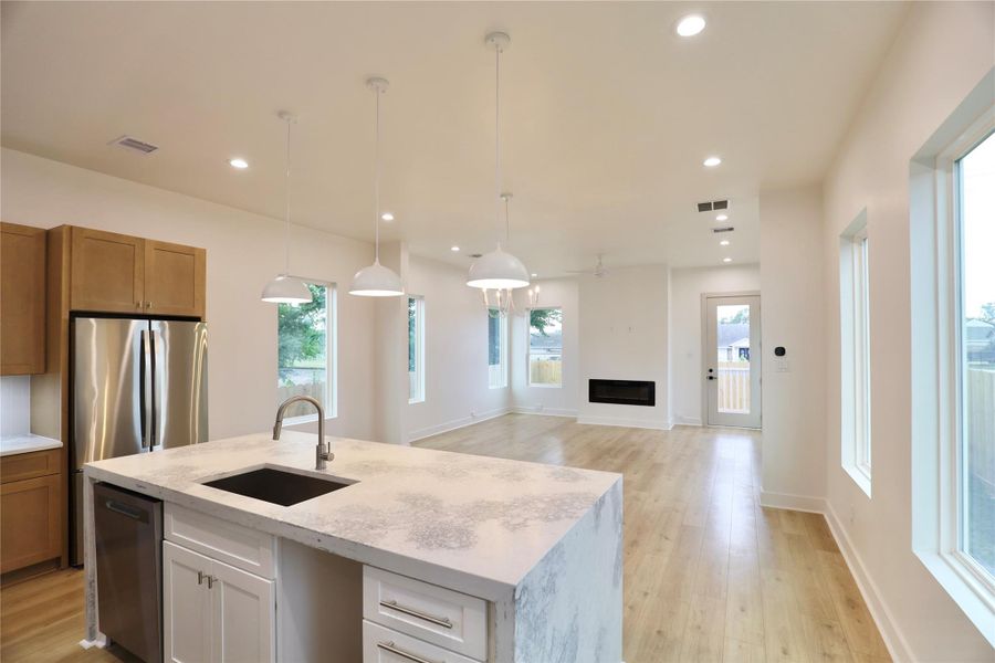 Designed with natural light at the forefront, this home features a builder-upgraded open floor plan, paired with windows that invite an abundance of sunlight, creating a warm and vibrant living space. Designed with natural light at the forefront, this home features a builder-upgraded open floor plan, paired with windows that invite an abundance of sunlight, creating a warm and vibrant living space.