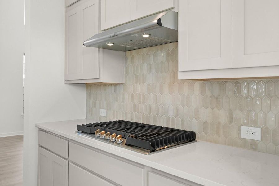 Aaand a 36" gas cooktop with 5 burners