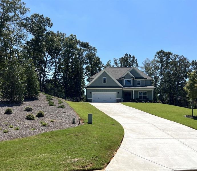 Front exterior of a new home in Griffin Manor, Cartersville, GA, highlighting curb appeal (Image 2). Front exterior of a new home in Griffin Manor, Cartersville, GA, highlighting curb appeal (Image 2).