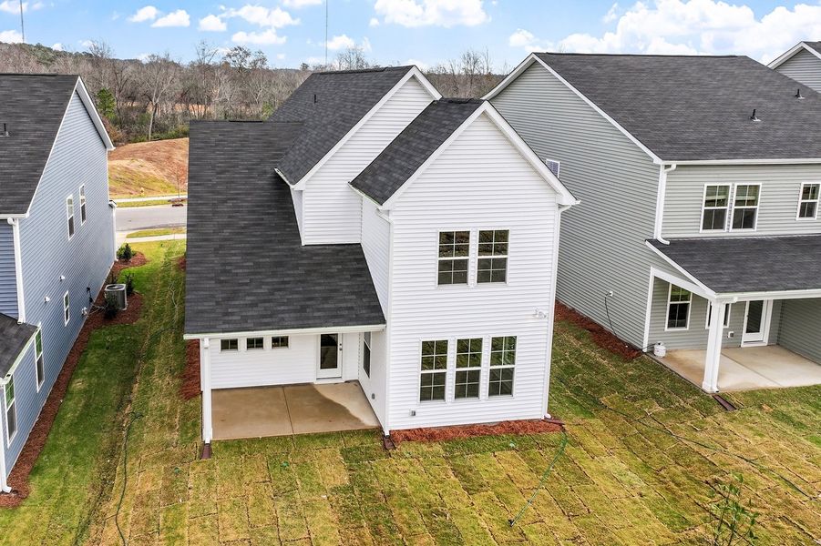 Exterior details and patio area of a home in Renaissance at White Oak, Garner (Image 3).