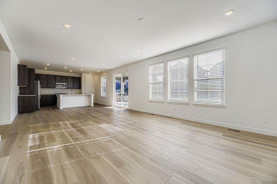 Spacious, unfurnished interior of a new home in Newlin Crossing: The Monarch Collection, Parker (Image 13).