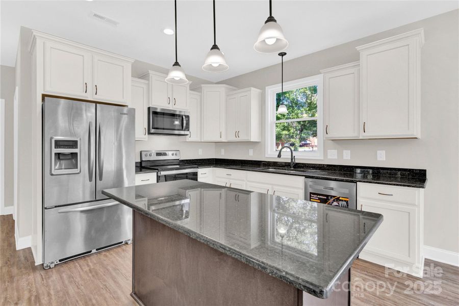 Furnished interior view inside a new home in , Huntersville (Image 7).