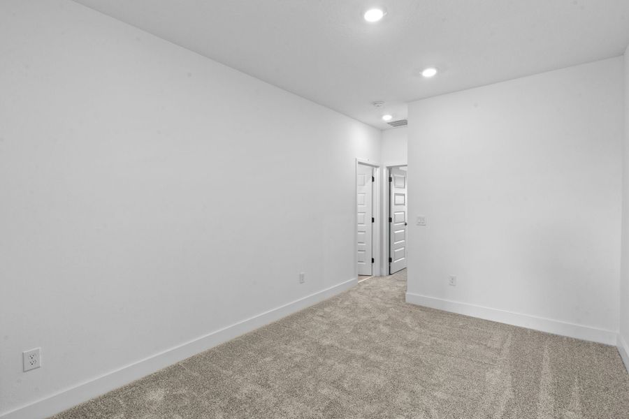 Representative unfurnished interior of a home built from the Edison by Rockwell Homes in Harvest at Ovation - Townhomes, Winter Garden (Image 87). Representative unfurnished interior of a home built from the Edison by Rockwell Homes in Harvest at Ovation - Townhomes, Winter Garden (Image 87).