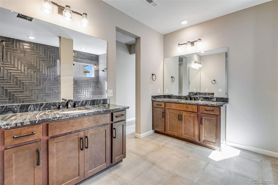 Furnished interior view inside a new home in Ensemble at The Aurora Highlands, Aurora (Image 9). Furnished interior view inside a new home in Ensemble at The Aurora Highlands, Aurora (Image 9).