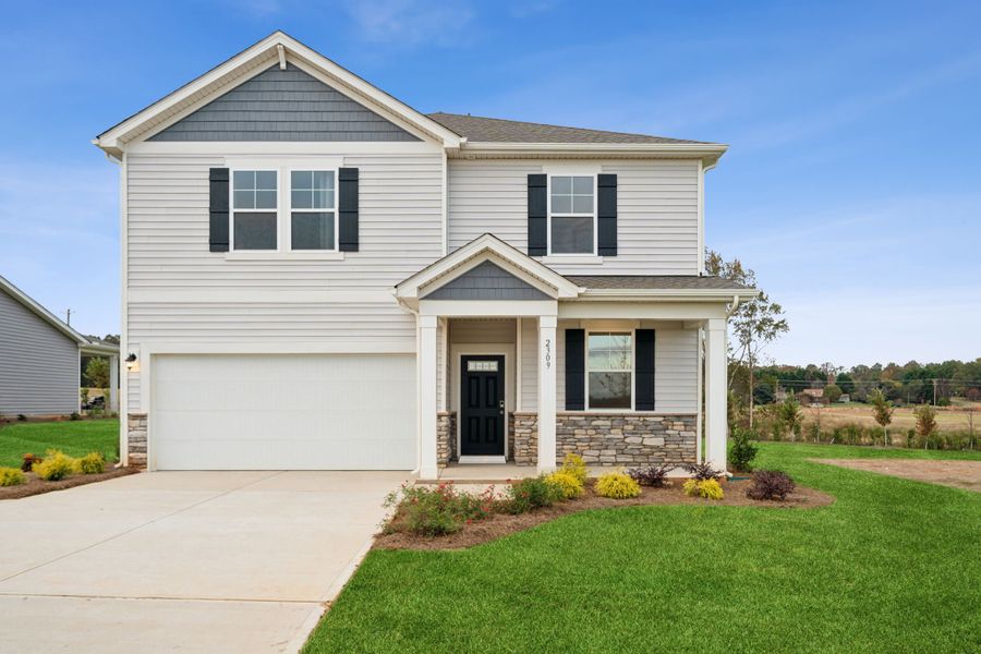 A house with a front yard.