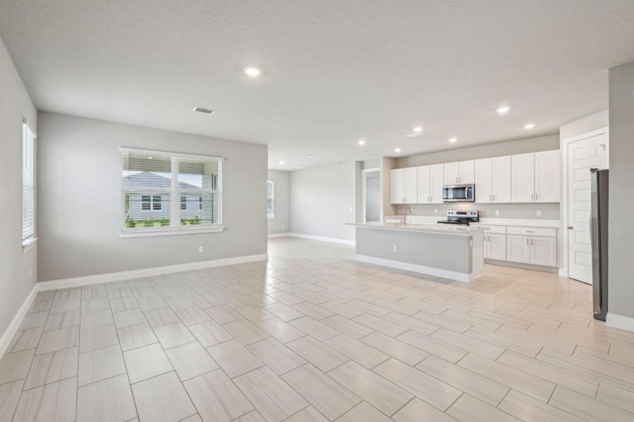 Spacious, unfurnished interior of a new home in Brystol at Wylder - Reserve Series, Port St. Lucie (Image 26).