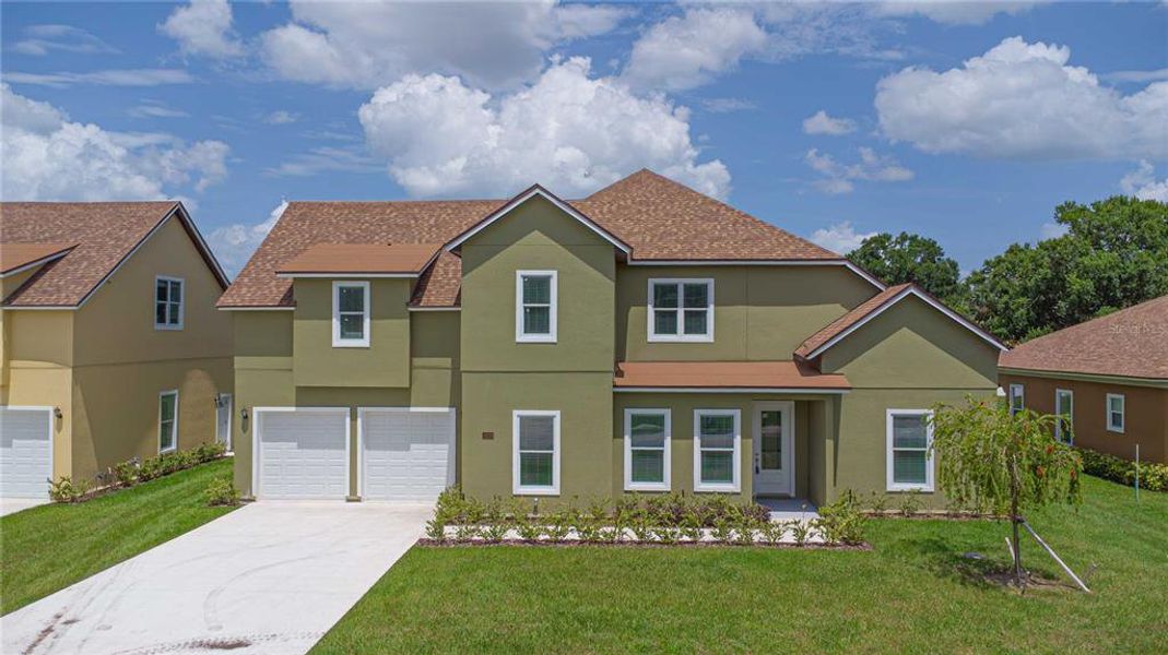 Front exterior of a new home in , Sanford, FL, highlighting curb appeal (Image 25).