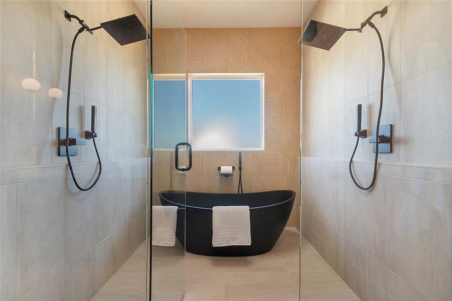 Full bathroom with a walk in shower, tile patterned flooring, and tile walls Full bathroom with a walk in shower, tile patterned flooring, and tile walls