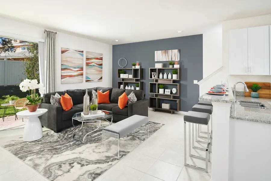 Representative furnished interior of a home built from the Kennedy by Park Square Residential in Townwalk at Babcock Ranch, Punta Gorda (Image 8).