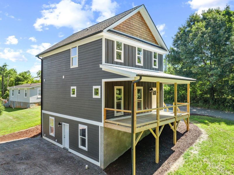 Front exterior of a new home in , Asheville, NC, highlighting curb appeal (Image 23).