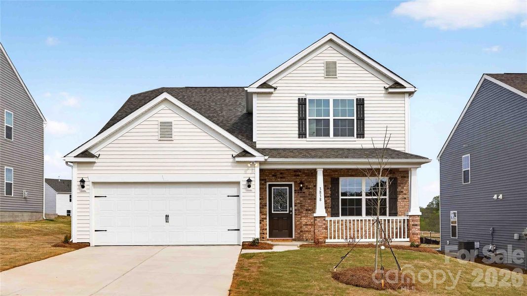 Front exterior of a new home in Cline Village, Conover, NC, highlighting curb appeal (Image 1). Front exterior of a new home in Cline Village, Conover, NC, highlighting curb appeal (Image 1).