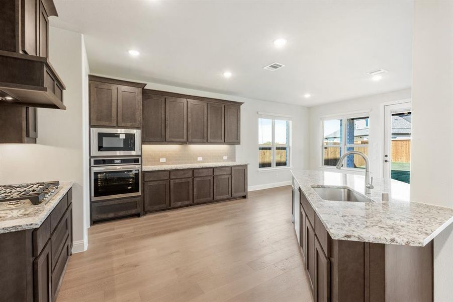 Furnished interior view inside a new home in Creekview Meadows, Pilot Point (Image 10).