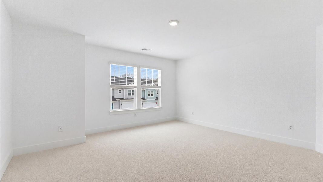 Furnished interior view inside a new home in Village at Midway, Anderson (Image 24).
