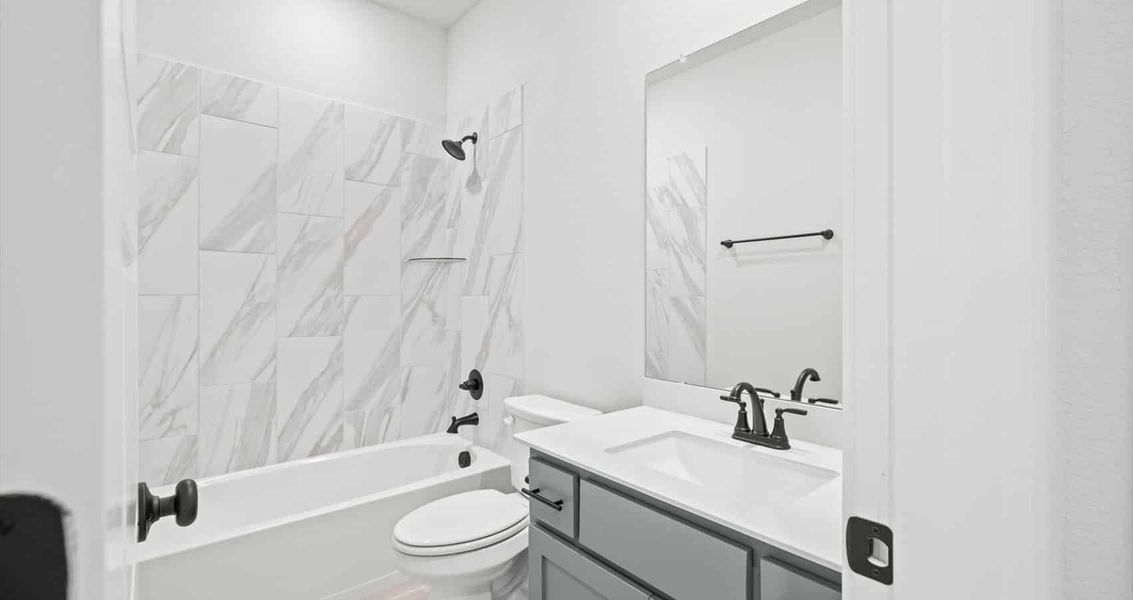 Furnished interior view inside a new home in Trace, San Marcos (Image 7).