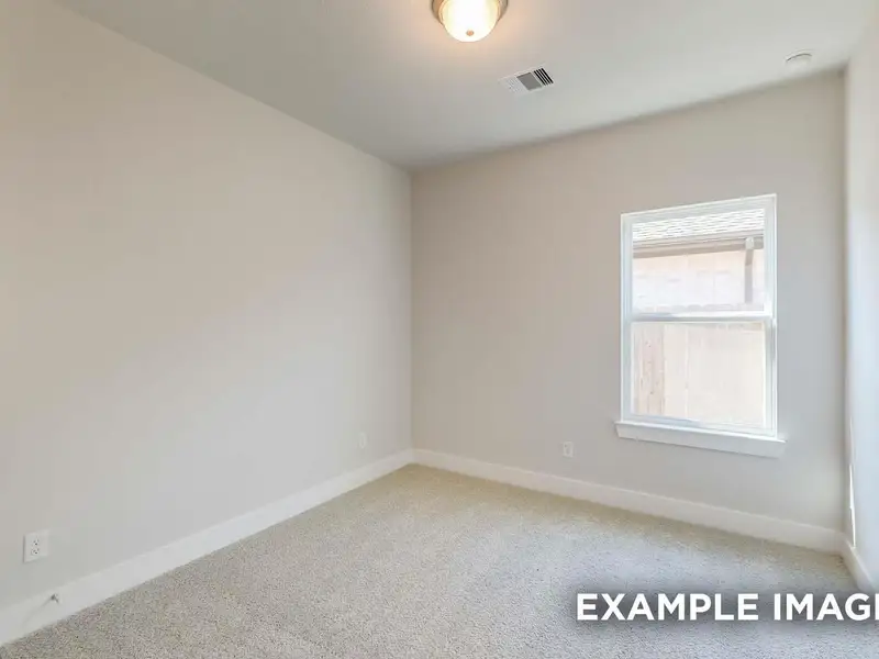 Spacious, unfurnished interior of a new home in Sunterra, Katy (Image 20).