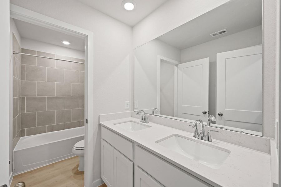 Furnished interior view inside a new home in Northpark South, Porter (Image 9). Furnished interior view inside a new home in Northpark South, Porter (Image 9).