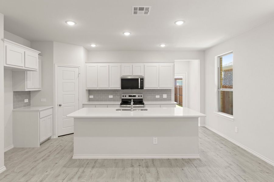Front exterior of a new home in Bryant Farms, Melissa, TX, highlighting curb appeal (Image 4).