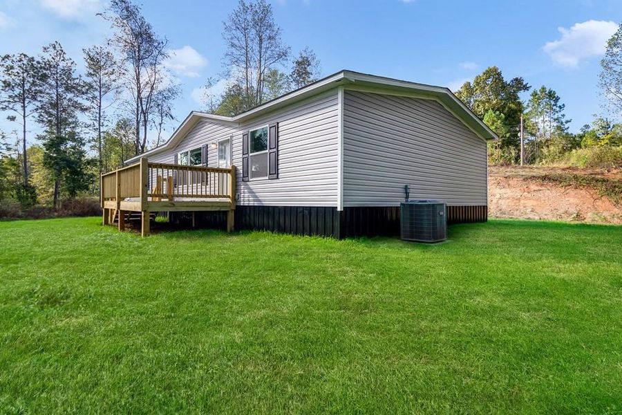Exterior details and patio area of a home in , Ellijay (Image 24).