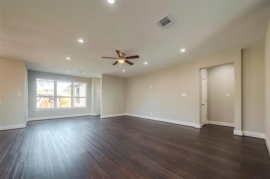 Open concept living room with high ceilings