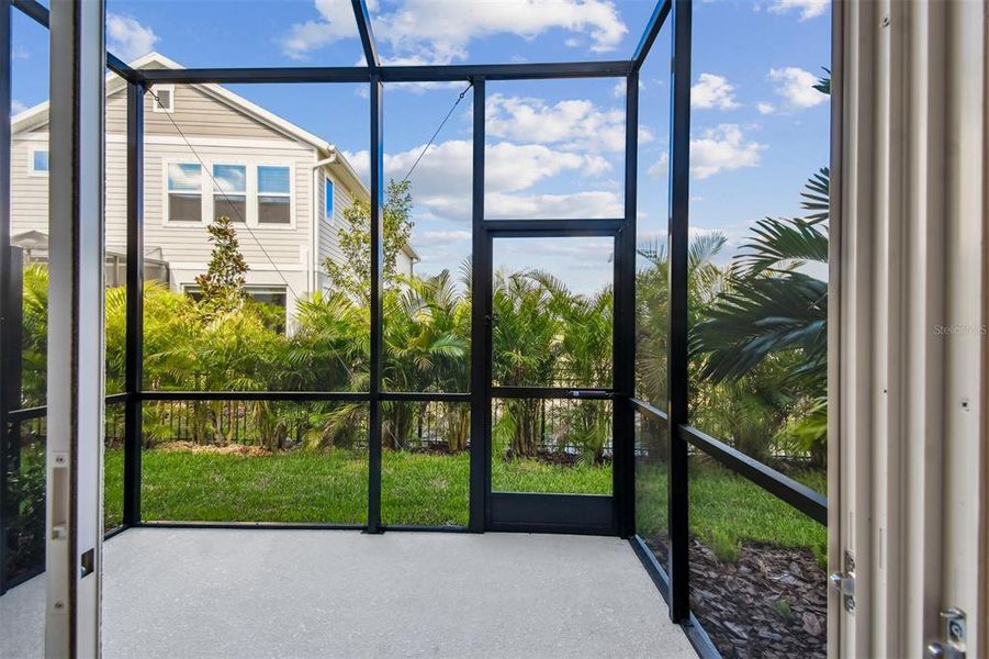Exterior details and patio area of a home in North River Ranch – Townhomes, Parrish (Image 28).