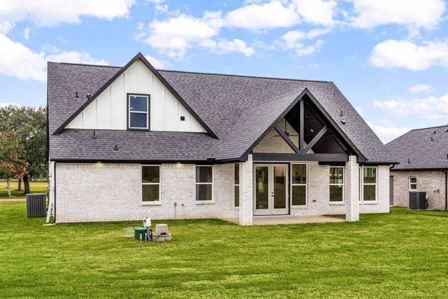 Exterior details and patio area of a home in , Waller (Image 32).