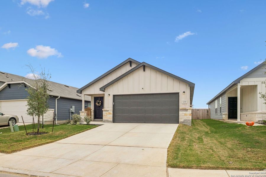 Front exterior of a new home in , San Antonio, TX, highlighting curb appeal (Image 25).