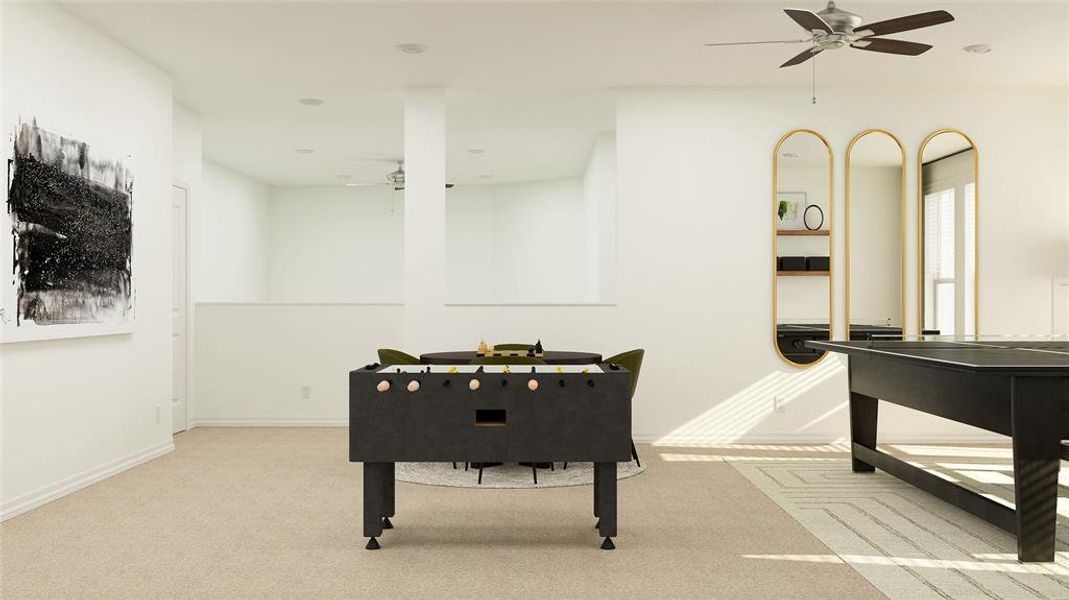 Recreation room featuring carpet and ceiling fan