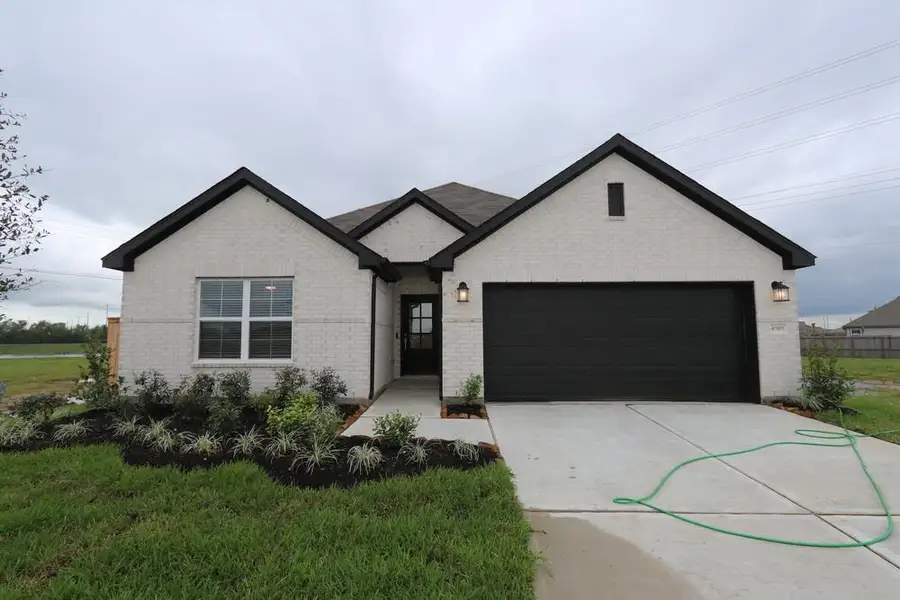 Front exterior of a new home in Ambrose, La Marque, TX, highlighting curb appeal (Image 1). Front exterior of a new home in Ambrose, La Marque, TX, highlighting curb appeal (Image 1).