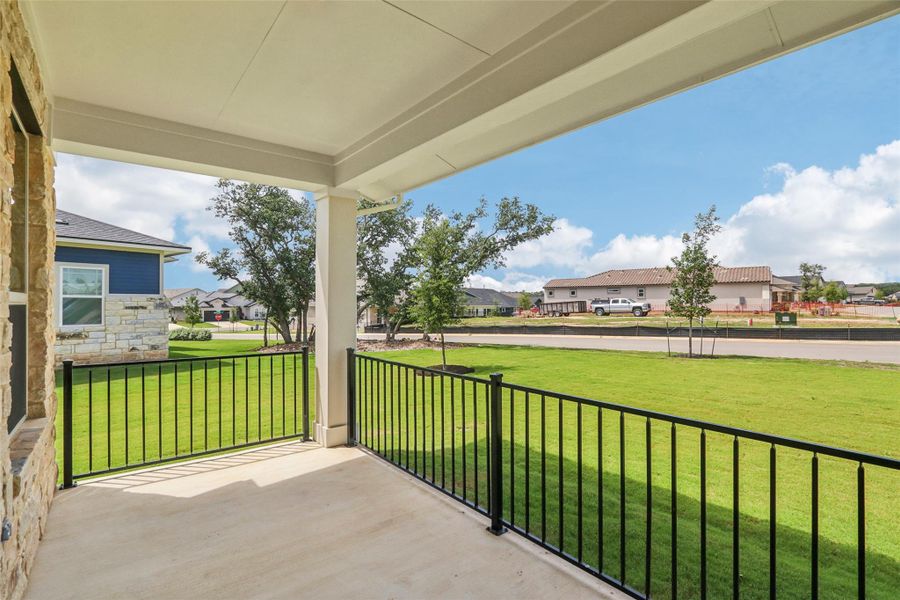 Covered porch with a residential view