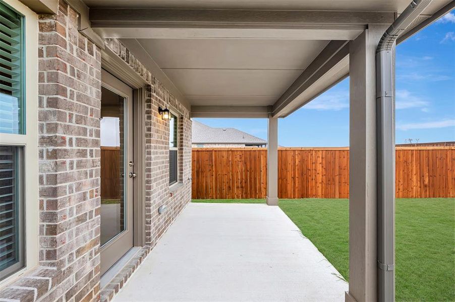 Exterior details and patio area of a home in The Preserve, Justin (Image 23). Exterior details and patio area of a home in The Preserve, Justin (Image 23).