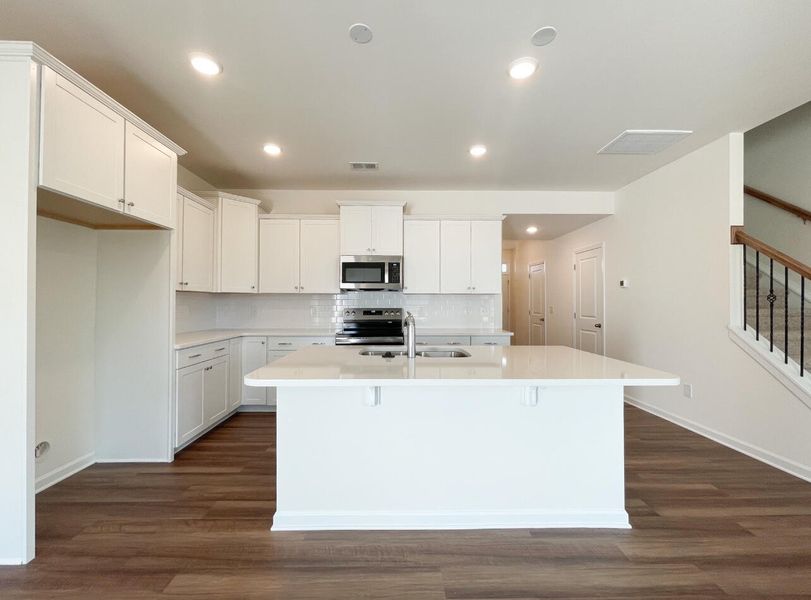 Furnished interior view inside a new home in Bellevue Townhomes, Greenville (Image 8).