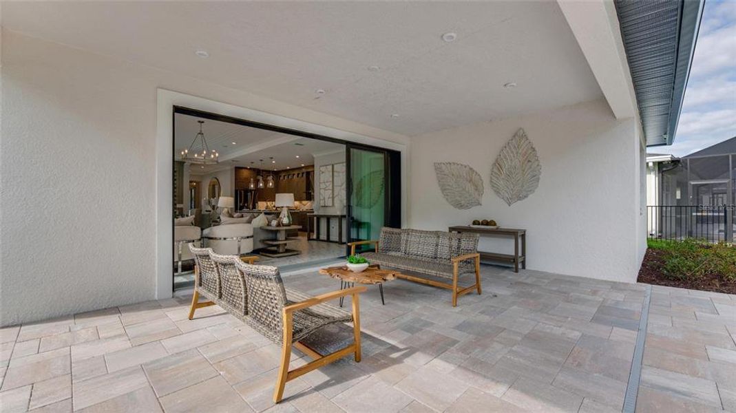 Exterior details and patio area of a home in Cresswind DeLand, Deland (Image 3).