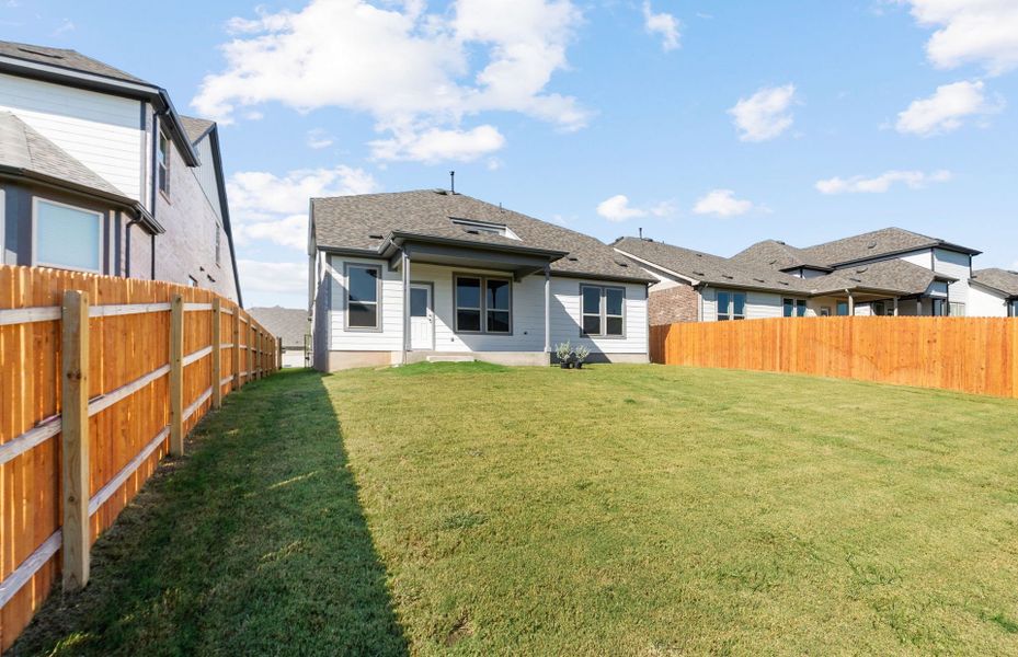 Exterior details and patio area of a home in Saddleback at Santa Rita Ranch, Liberty Hill (Image 26).