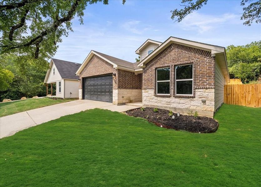Front exterior of a new home in , Fort Worth, TX, highlighting curb appeal (Image 16). Front exterior of a new home in , Fort Worth, TX, highlighting curb appeal (Image 16).