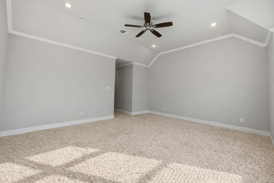 Bask in all-day sunshine thanks to walls of windows in this luminous bedroom. Whether you’re curling up with a book or sipping your first coffee—this space just feels good.