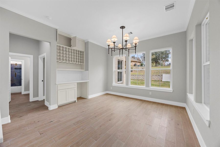Dining area, note the wine rack & built-ins. Dining area, note the wine rack & built-ins.