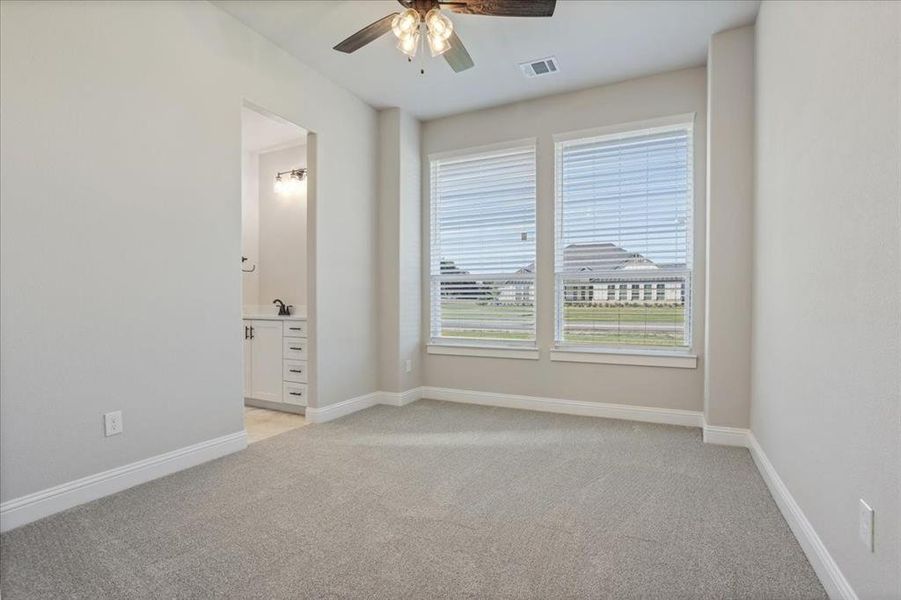One of the secondary bedrooms One of the secondary bedrooms